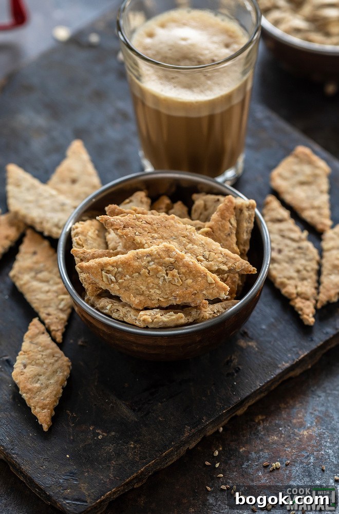a small bowl with diamond shaped oats namak pare placed in it