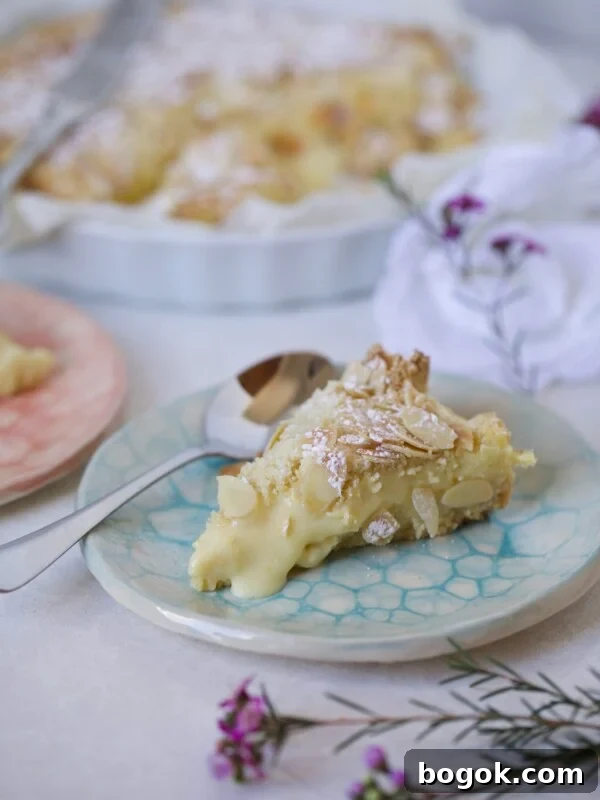 Italian Cake slice on a plate cream filling oozing out of slice