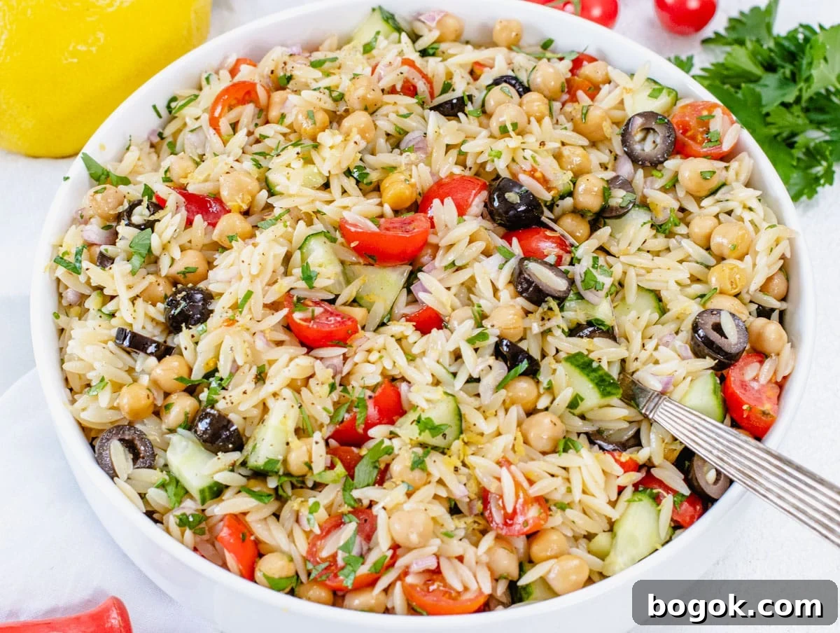 40 Delicious Chickpea Recipes for Every Meal and Occasion 18 orzo salad in a large bowl