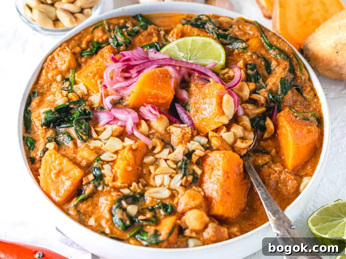 40 Delicious Chickpea Recipes for Every Meal and Occasion 27 African peanut stew with spinach and sweet potato in a white bowl