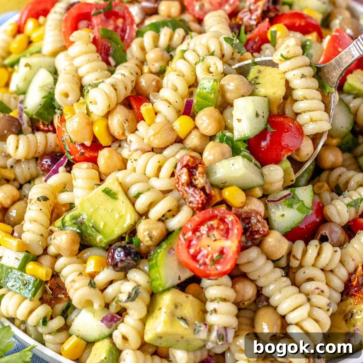 40 Delicious Chickpea Recipes for Every Meal and Occasion 4 Easy Chickpea Pasta with a silver spoon