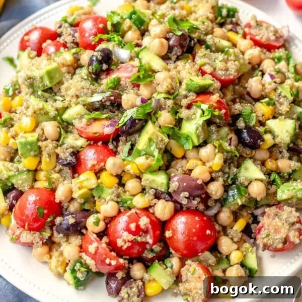 40 Delicious Chickpea Recipes for Every Meal and Occasion 36 A vegan high protein meal with chickpeas, quinoa, and vegetables on a plate.