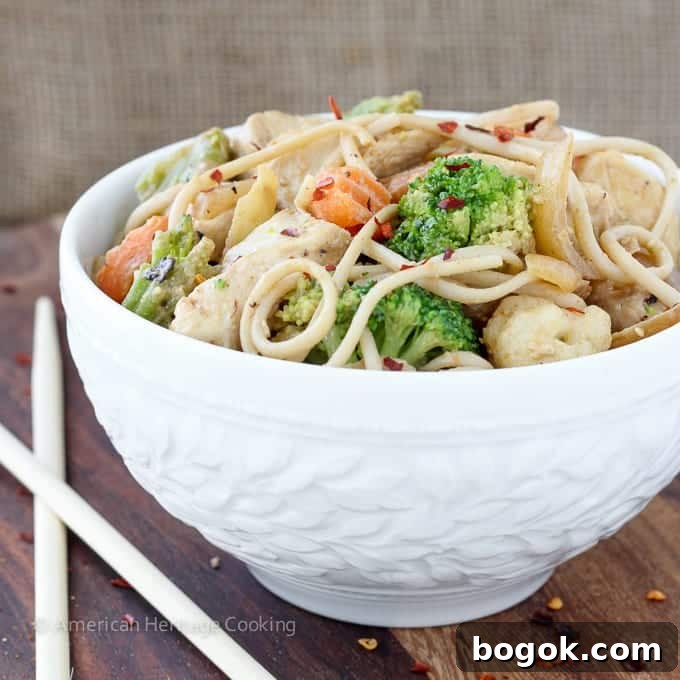 Thai Peanut Chicken Noodle Stir-Fry Recipe for Weeknight Meals 3 Dinner on the table in less than 20 minutes with this easy Thai Peanut Chicken Noodle Stir Fry!! | Mixed vegetables and chicken are tossed with whole wheat udon noodles and a spicy sweet Thai peanut sauce!