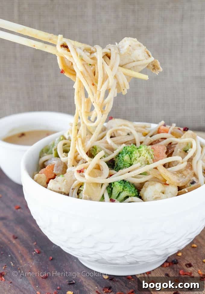 Thai Peanut Chicken Noodle Stir-Fry Recipe for Weeknight Meals 4 Dinner on the table in less than 20 minutes with this easy Thai Peanut Chicken Noodle Stir Fry!! | Mixed vegetables and chicken are tossed with whole wheat udon noodles and a spicy sweet Thai peanut sauce!