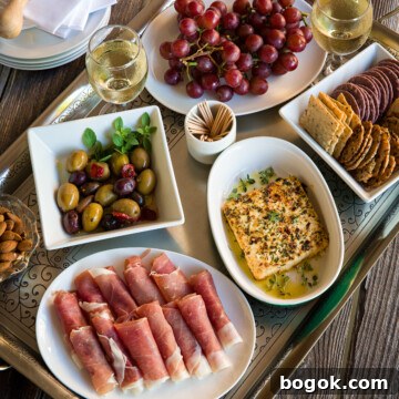 Mediterranean appetizer tray with baked feta (mezze platter).