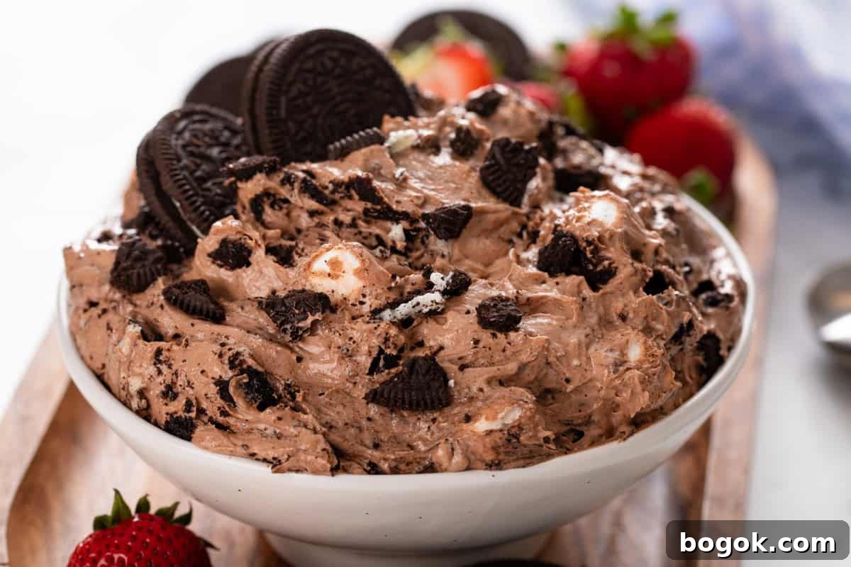 White serving bowl filled with oreo fluff.