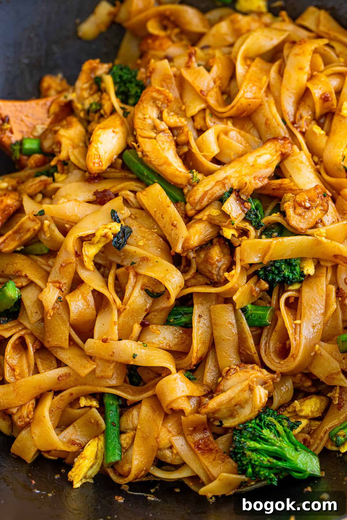 up close image of finished Thai Pad See Ew in wok