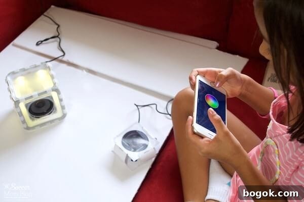 Child assembling a speaker cube