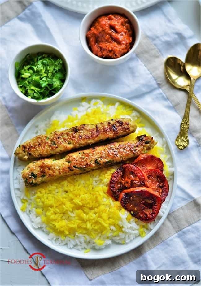 Authentic Chicken Seekh Kebab Recipe: Juicy Grilled Skewers 5 chicken seekh kabab two pieces served on yellow rice