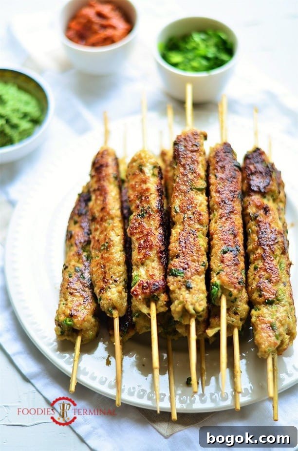Authentic Chicken Seekh Kebab Recipe: Juicy Grilled Skewers 8 chicken keema kabab stacked on a plate