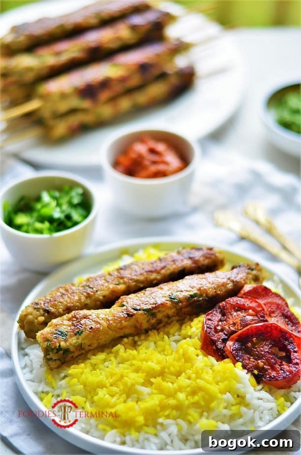 Authentic Chicken Seekh Kebab Recipe: Juicy Grilled Skewers 11 Chicken seekh kabab served with rice & roasted tomato wedges