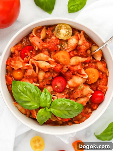 A white bowl filled with vegan bolognese