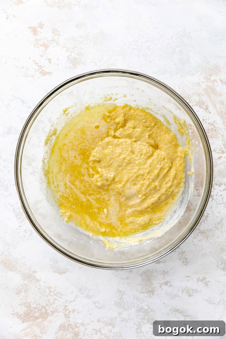 Cornbread mix with melted butter poured on top.