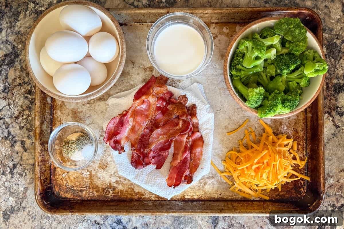 Low-Carb Bacon and Broccoli Breakfast Casserole 4 Ingredients for low carb bacon broccoli breakfast casserole including eggs, bacon, broccoli, cheddar cheese, and seasonings.