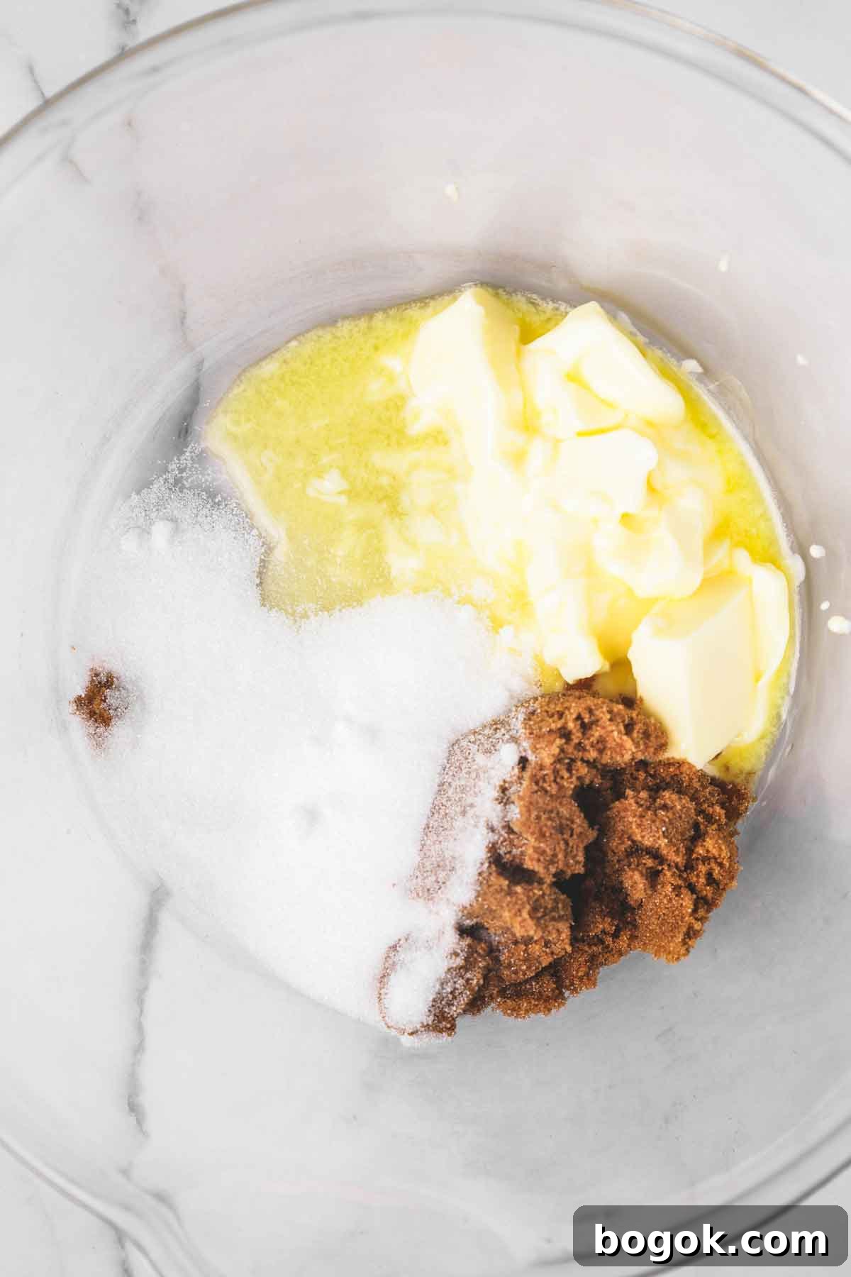 Soft Molasses Gingerbread Cookies Recipe 5 large mixing bowl with butter sugar and molasses