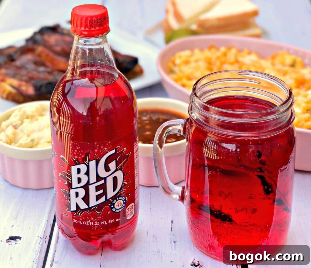 mac and cheese, red soda, with side dishes