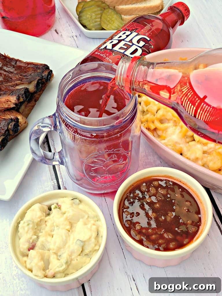 mac and cheese, red soda, with side dishes