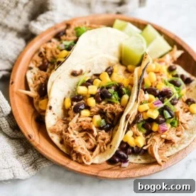 BBQ Chicken and Sweet Potato Casserole Recipe 12 three instant pot bbq chicken tacos topped with black bean and corn salsa on a wooden plate on a marble surface