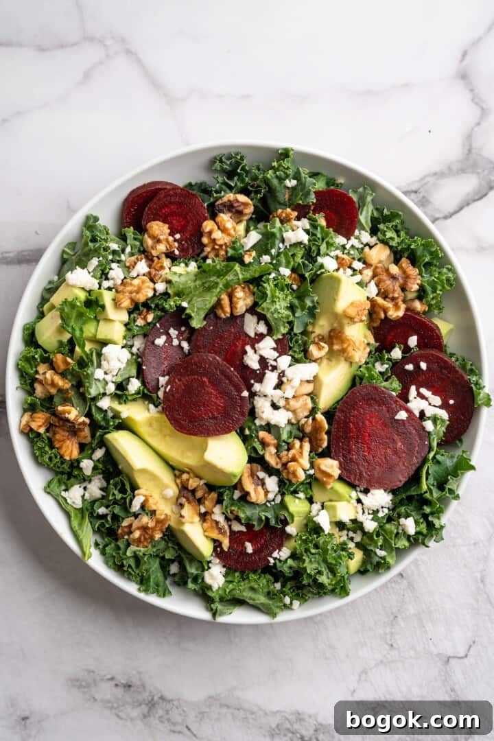 Overhead view of beet feta salad in bowl before adding dressing