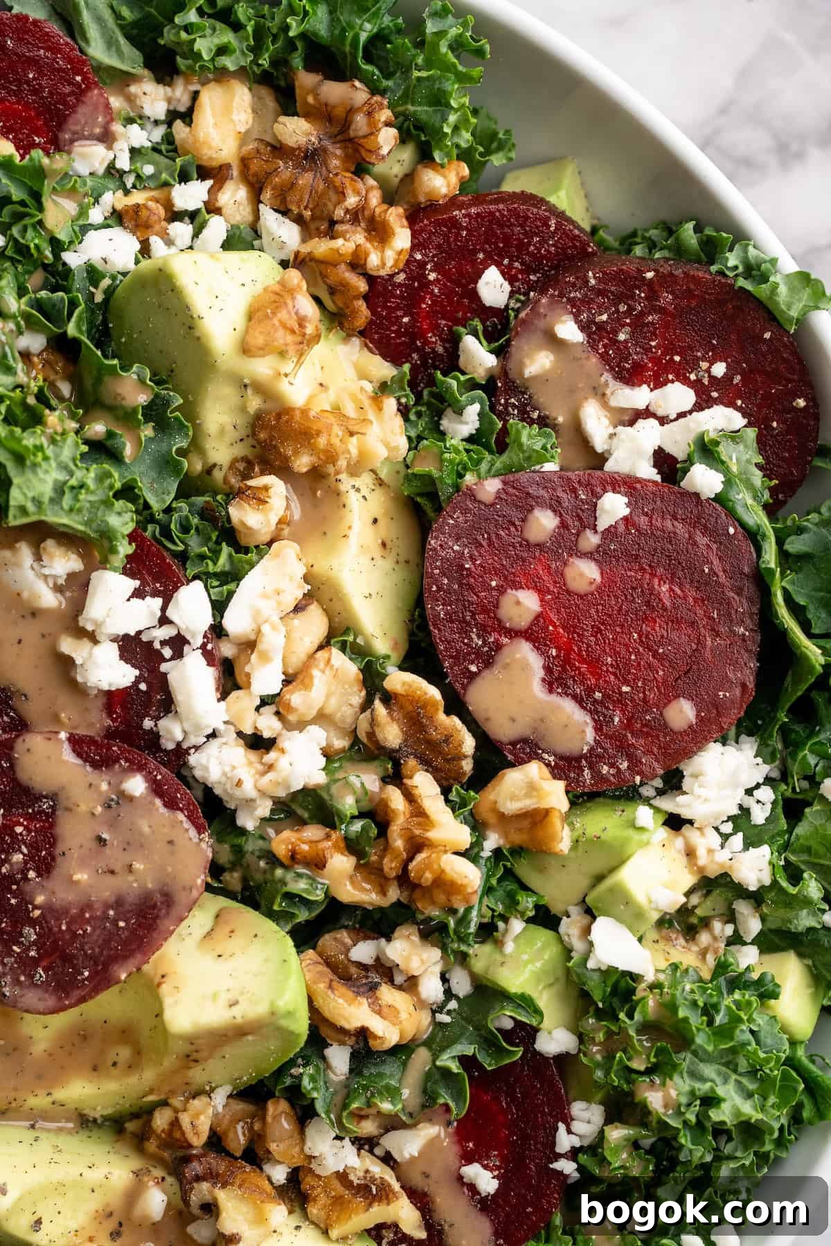 Overhead view of vegan beet feta salad in bowl