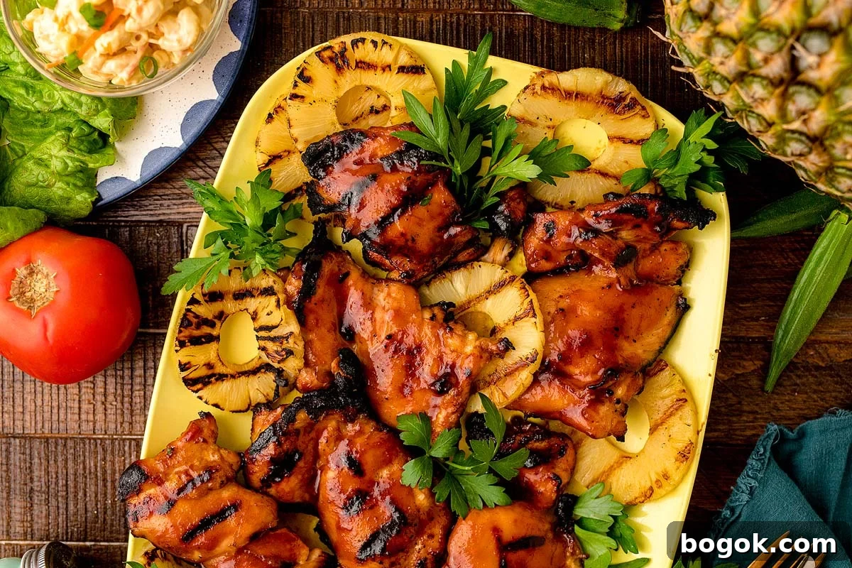 Hawaiian-Style BBQ Chicken with Pineapple Glaze 2 A platter of grilled Hawaiian BBQ chicken.