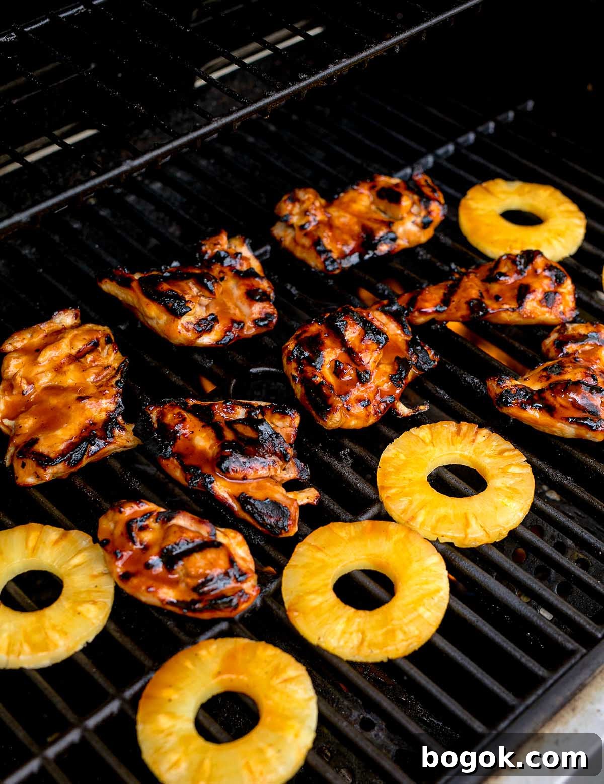 Hawaiian-Style BBQ Chicken with Pineapple Glaze 18 Sizzling on the barbecue, Hawaiian BBQ Chicken combines juicy chicken pieces with sweet pineapple rings for a tropical twist.