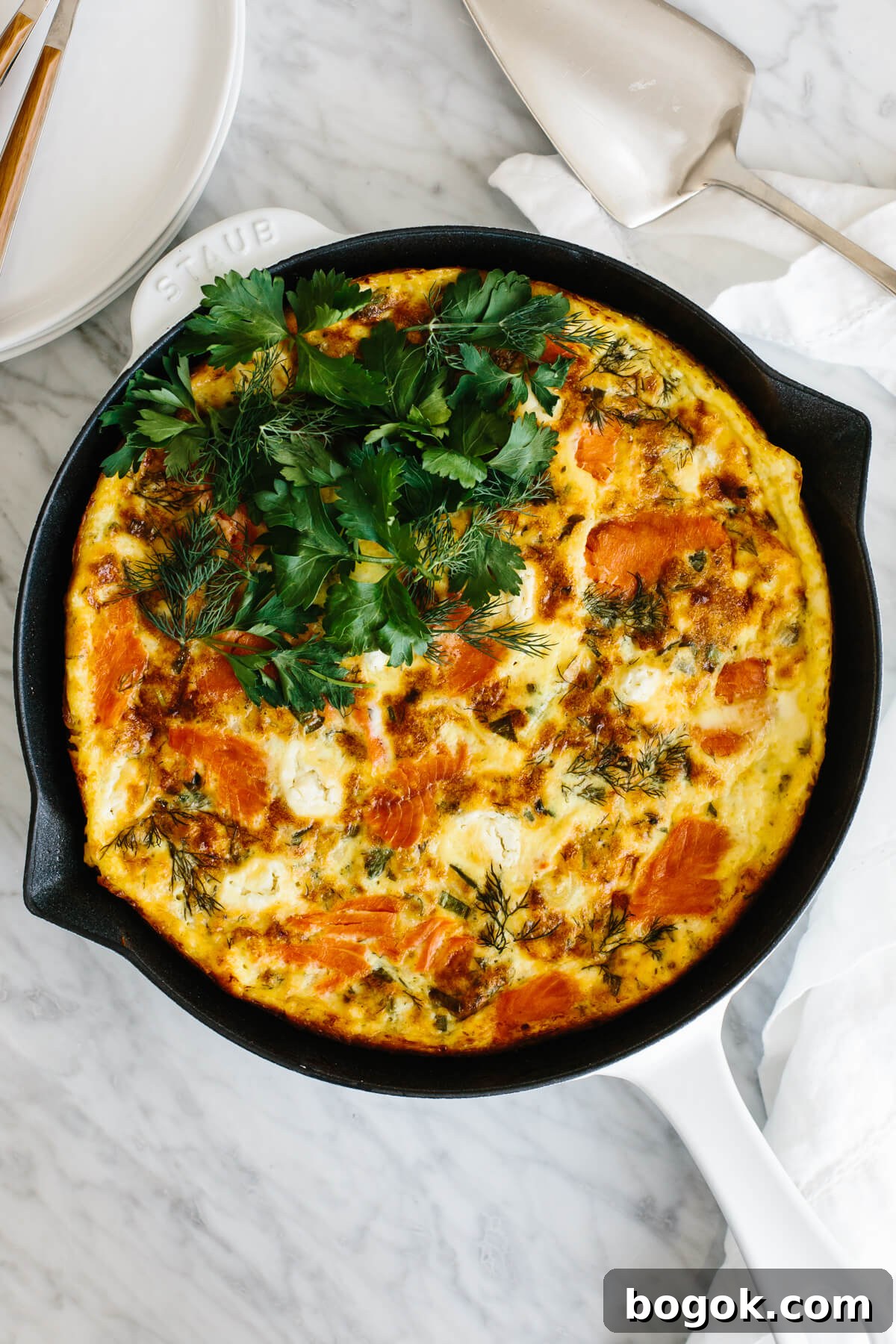 Smoked salmon frittata recipe in a pan.