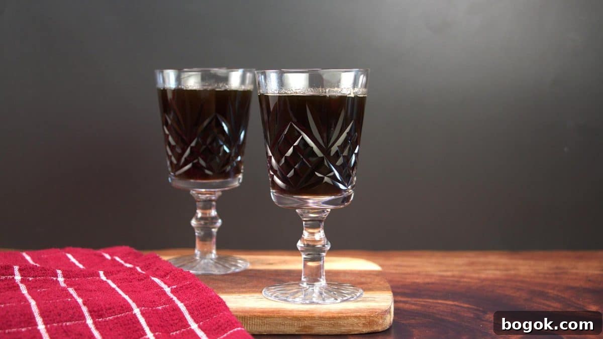Side view of two salted caramel bourbon cocktails - Hostess At Heart