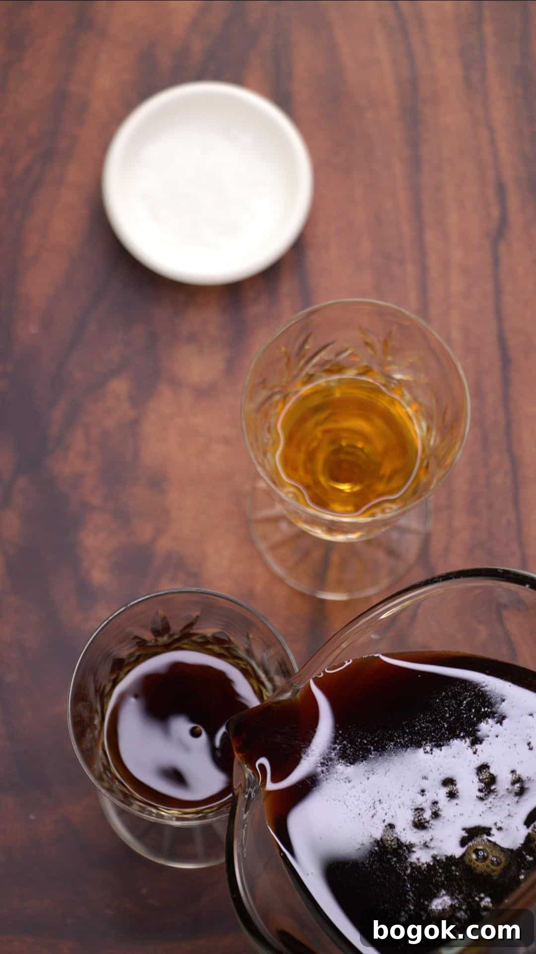 Brown sugar simple syrup added to a cocktail glass. Hostess At Heart