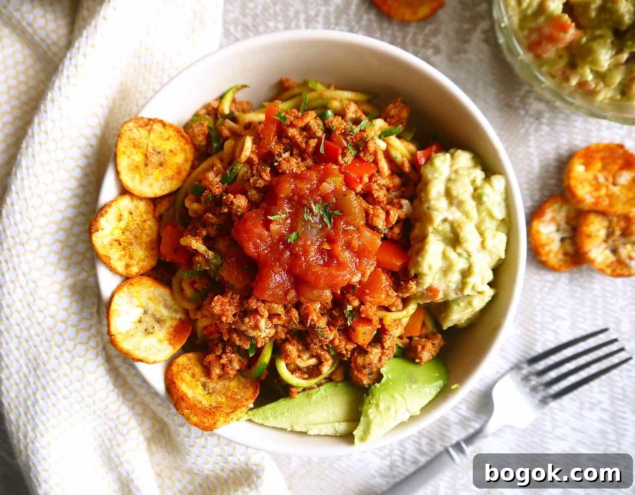 Ground Turkey Tacos with Zucchini Noodles (Zoodles) 8 Zucchini noodles seasoned with taco ground turkey meat.