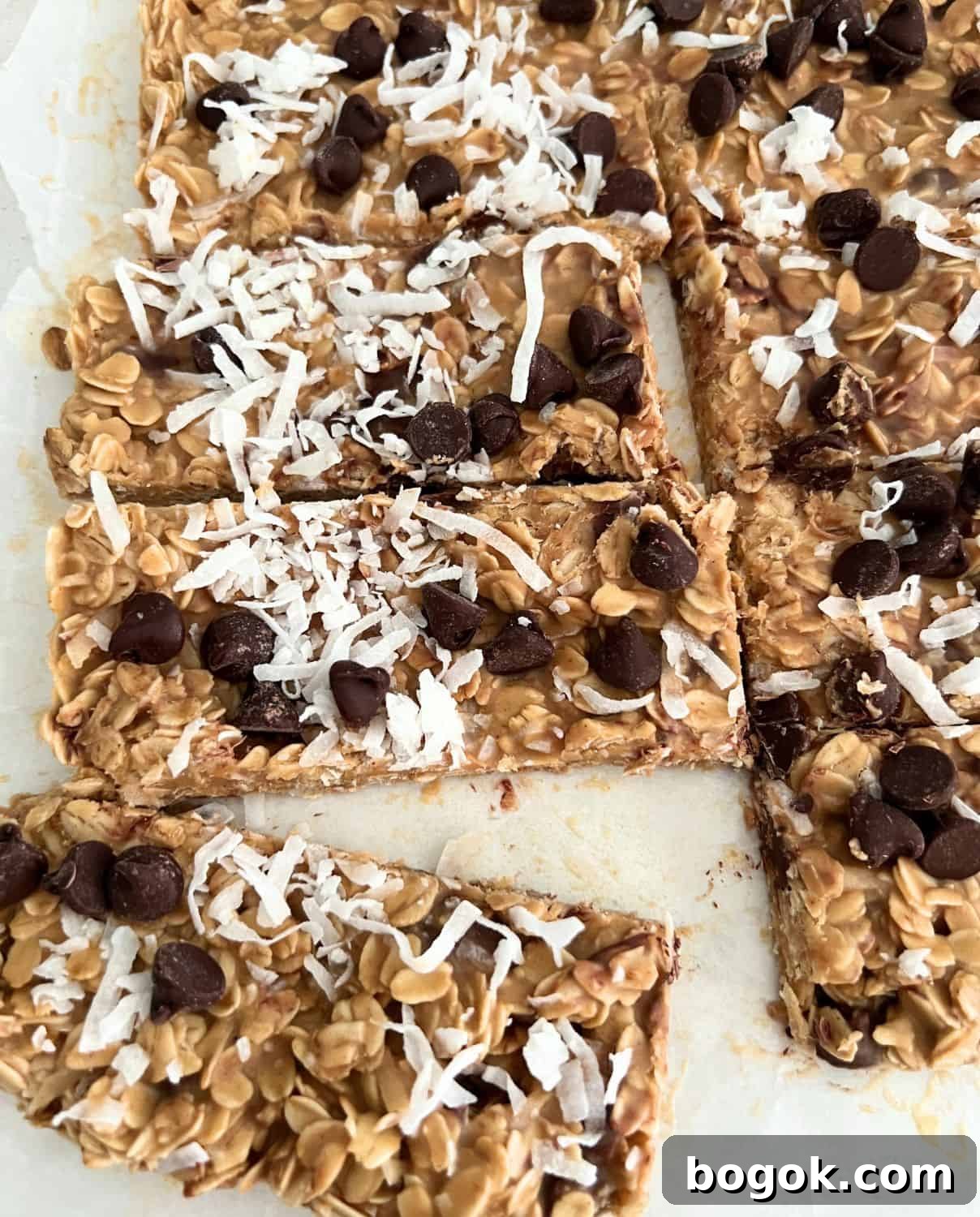 Chewy no bake granola bars topped with coconut and chocolate chips. 