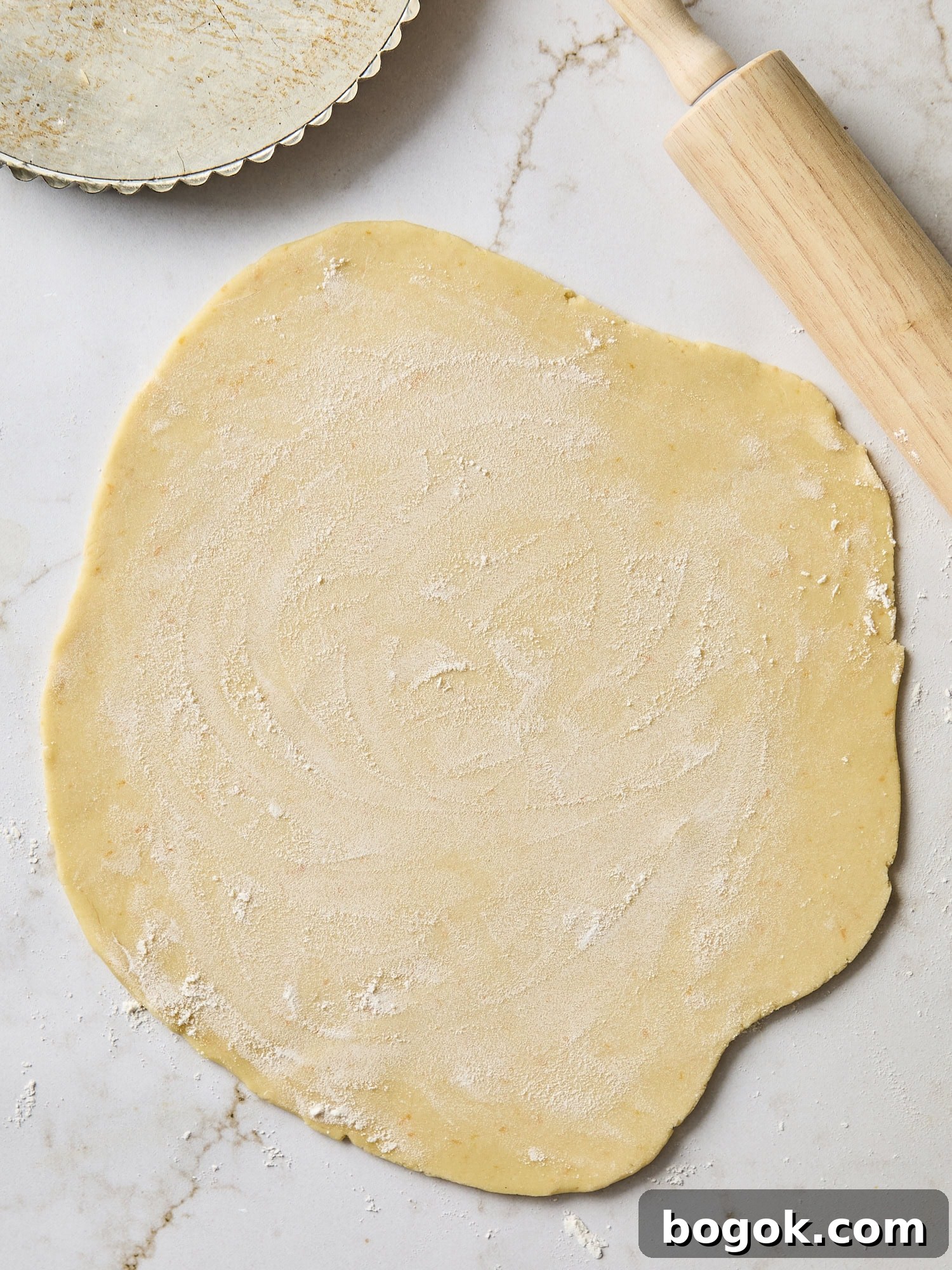 Rolled out pie dough.