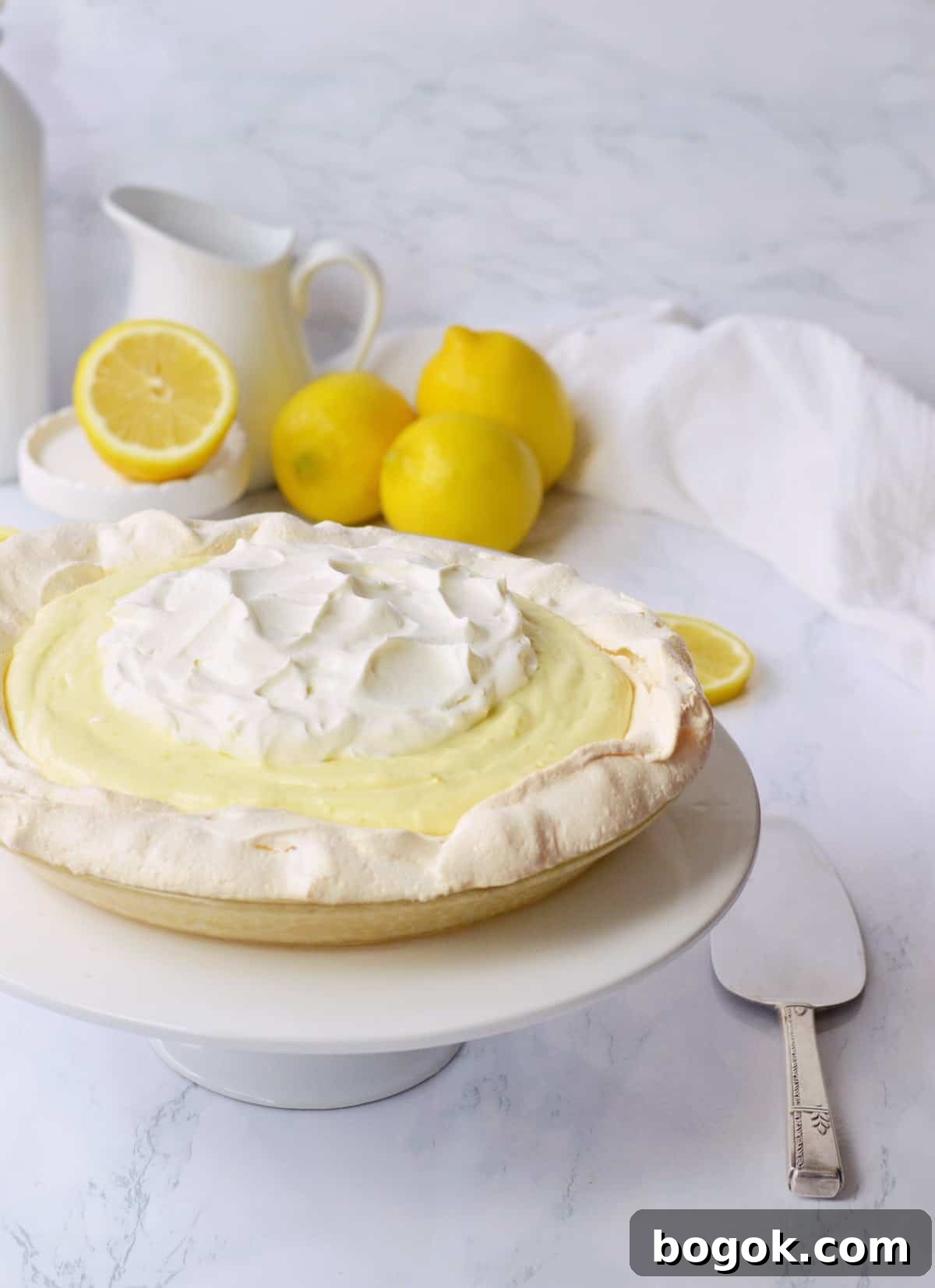 Light and Fluffy Lemon Angel Pie Recipe 2 Fresh lemon angel pie is ready to cut.