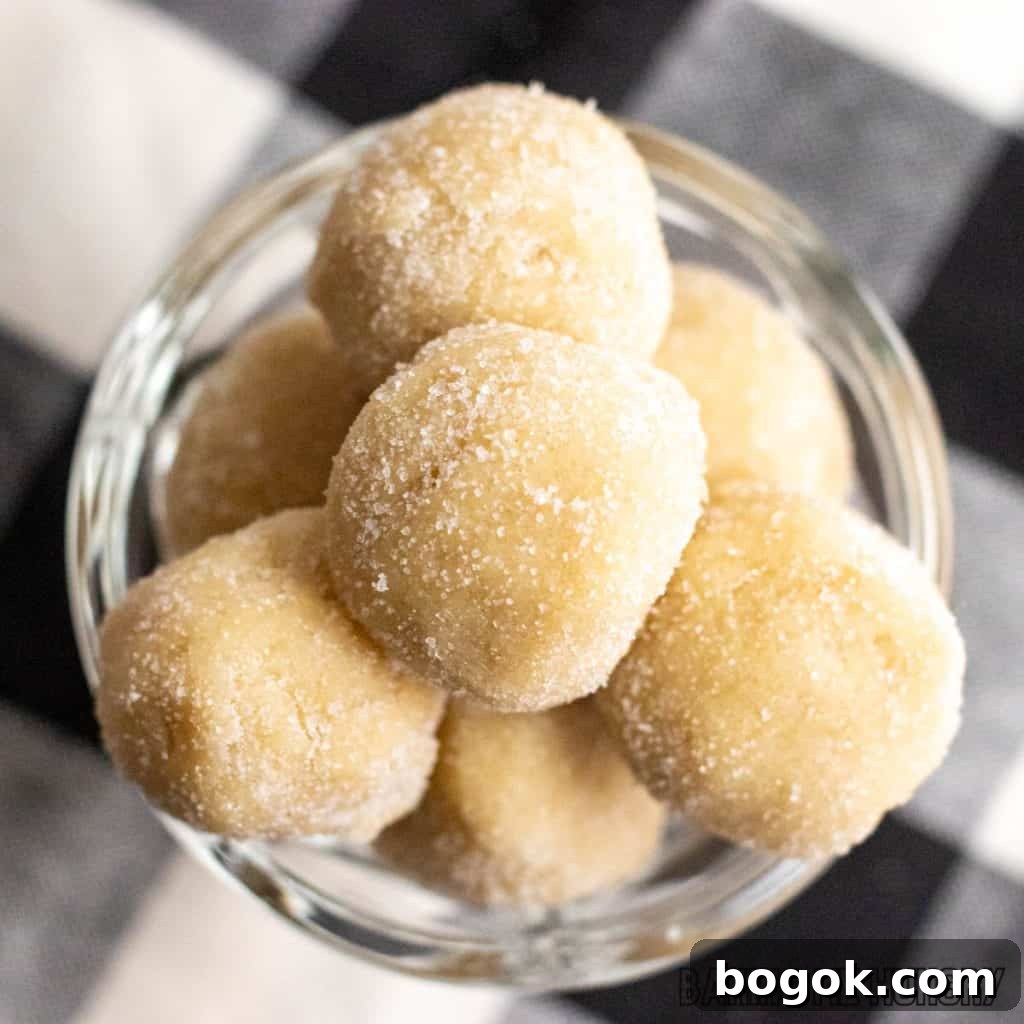 Safe-to-Eat Sugar Cookie Dough Recipe 2 edible sugar cookie dough close up in dish on plaid napkin