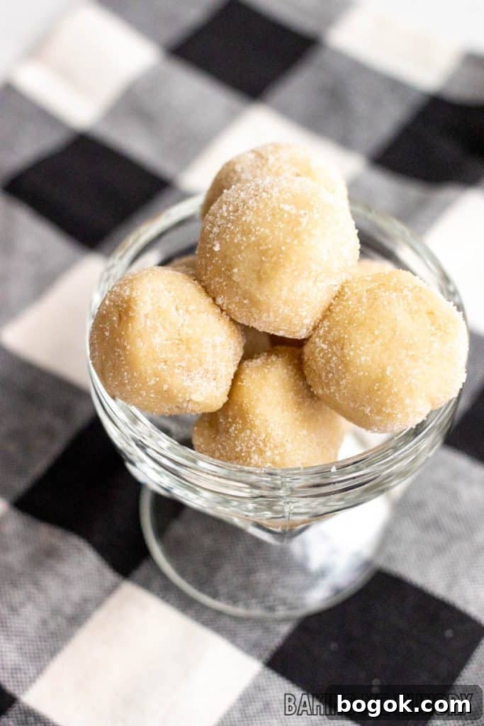 Safe-to-Eat Sugar Cookie Dough Recipe 3 edible sugar cookie dough in pedestal dish on plaid napkin