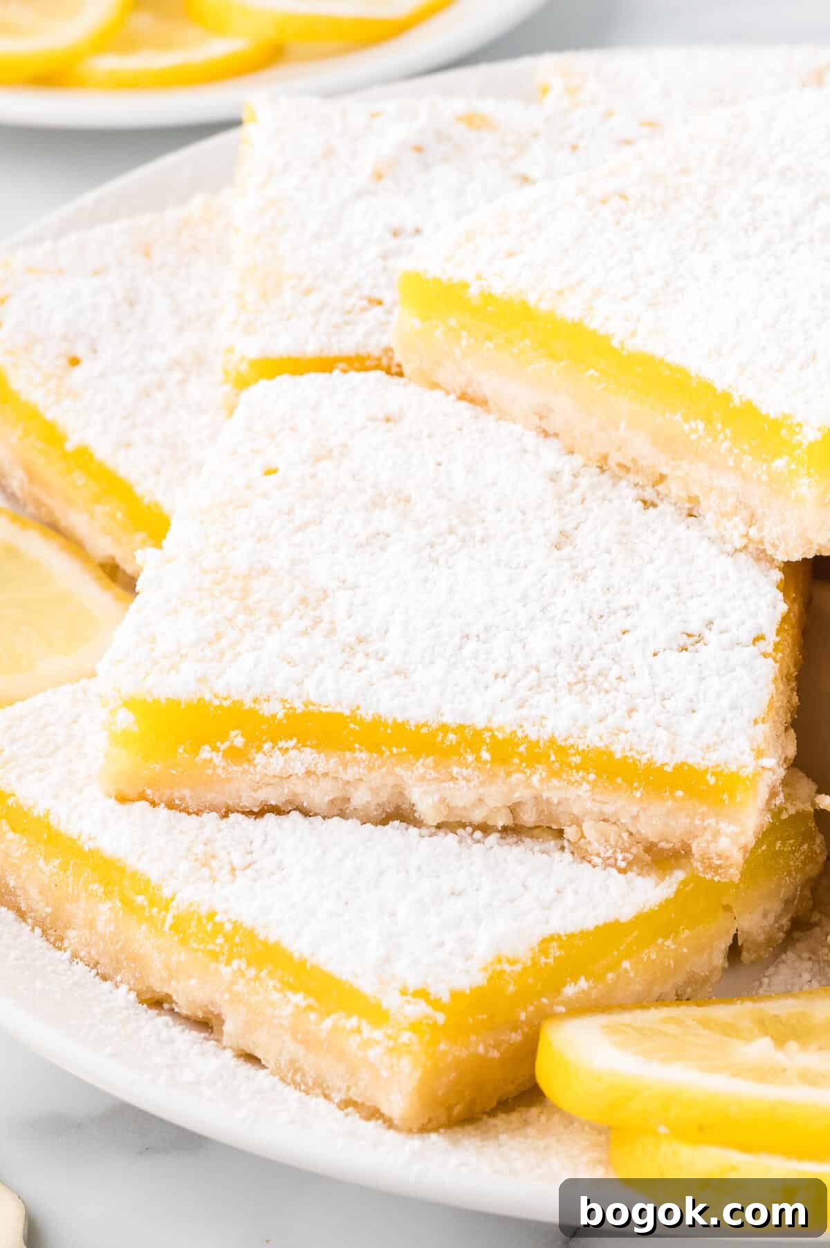 Classic Lemon Bars with Buttery Shortbread Crust 7 The recipe on a plate.