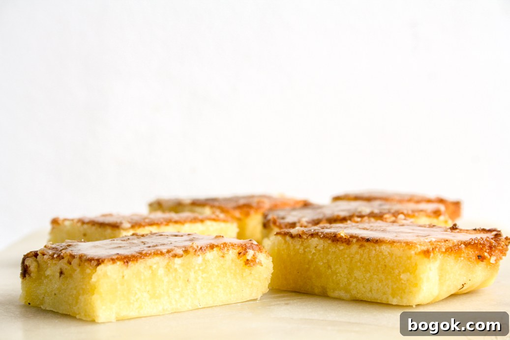 Moist, dense and gooey lemon blondies with lemon glaze