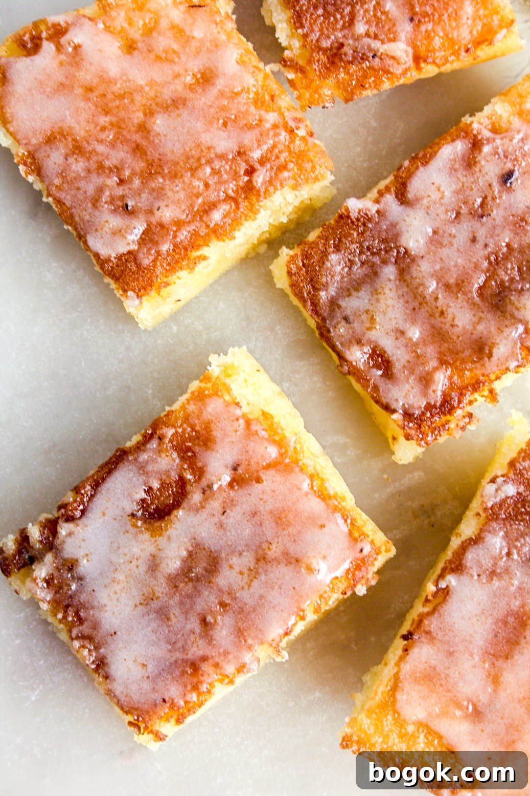 Moist, dense and gooey lemon blondies with lemon glaze