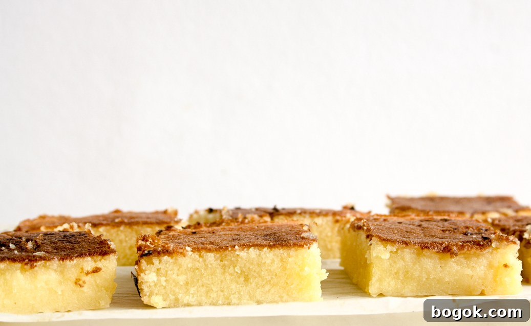Moist, dense and gooey lemon blondies with lemon glaze
