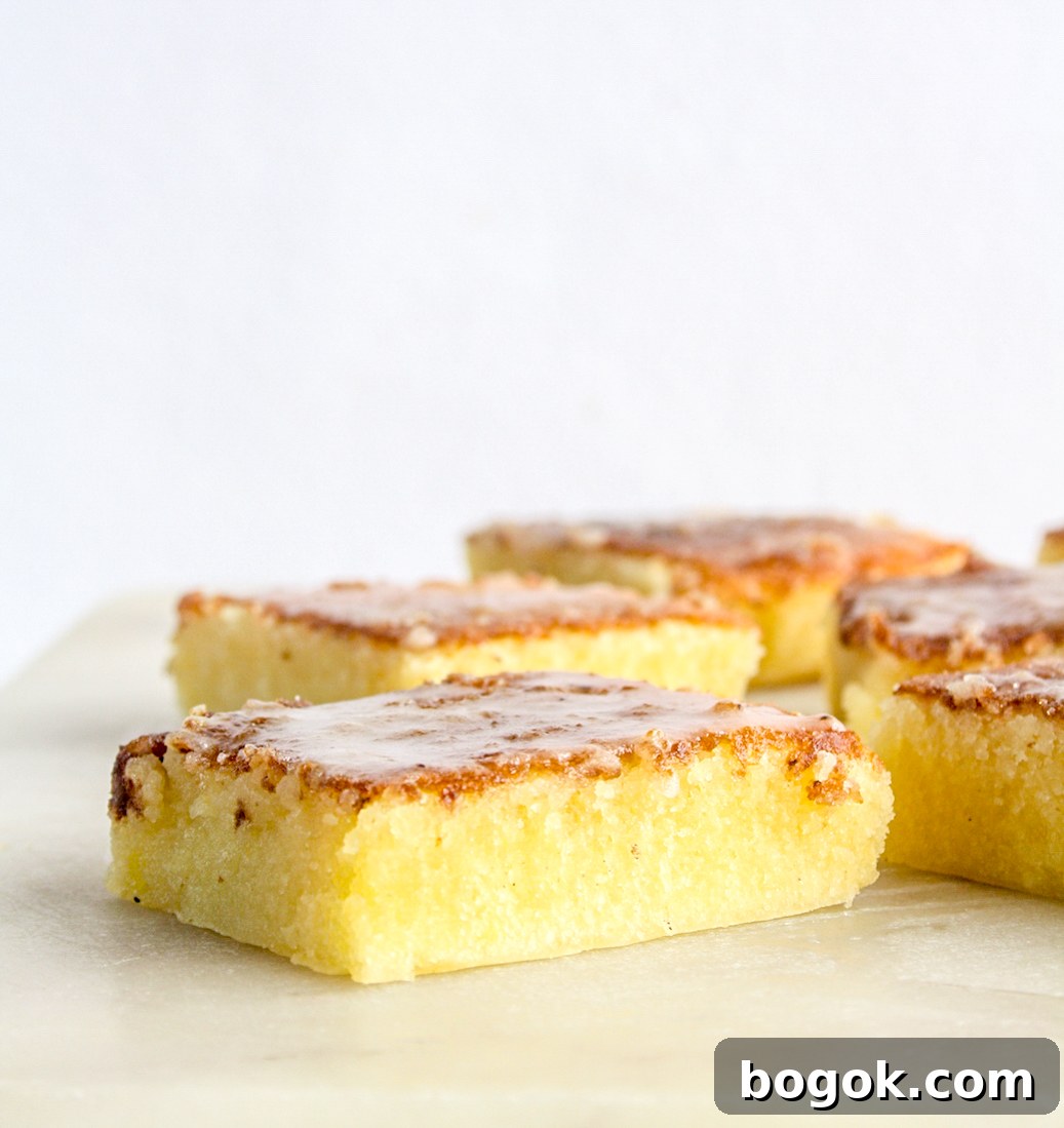 Moist, dense and gooey lemon blondies with lemon glaze