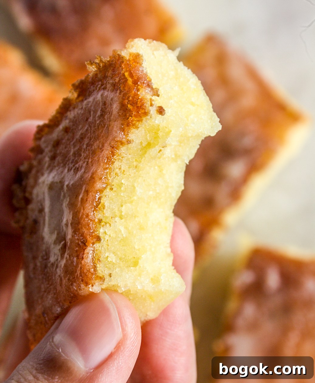 Moist, dense and gooey lemon blondies with lemon glaze