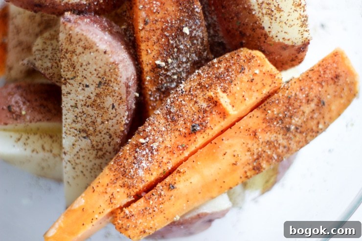Crispy Grilled Potato Wedges with Garlic Herb Dip 6 mixing potato wedges with chili pepper seasoning