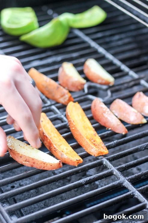 Crispy Grilled Potato Wedges with Garlic Herb Dip 7 Arranging potatoes on the grill
