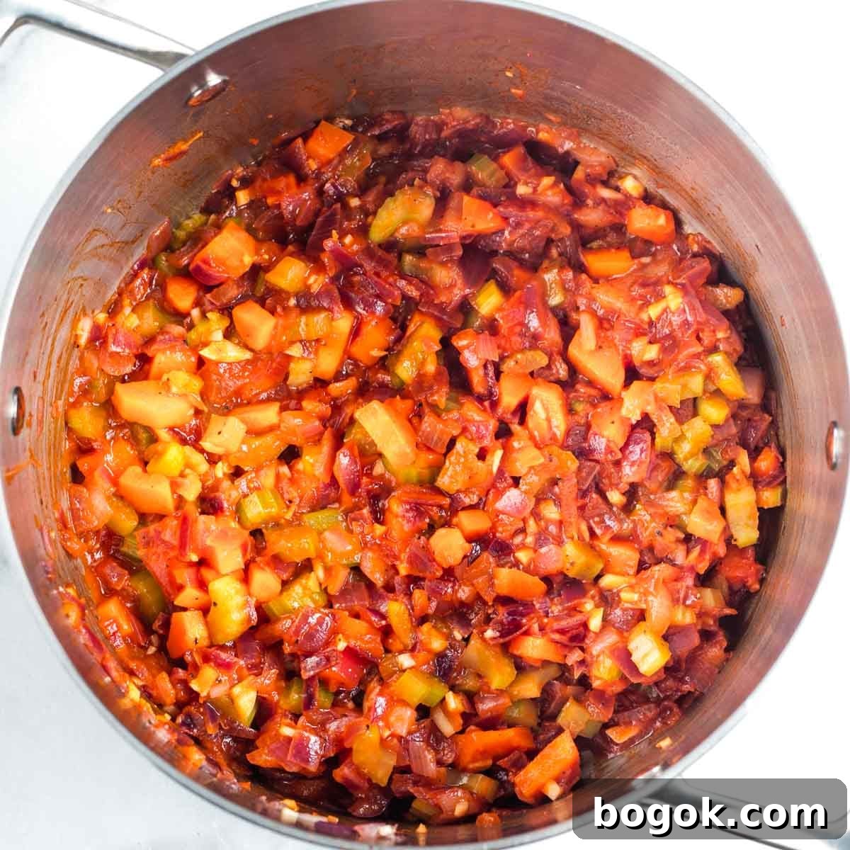 Hearty Vegan Miso Mushroom and Barley Soup Recipe 9 Onion, carrot and celery, sauteed with tomato paste.