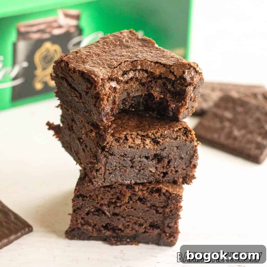 After Eight Mint Brownies Recipe — Classic Chocolate Mint Treat 2 after eight brownies in a stack in front of box