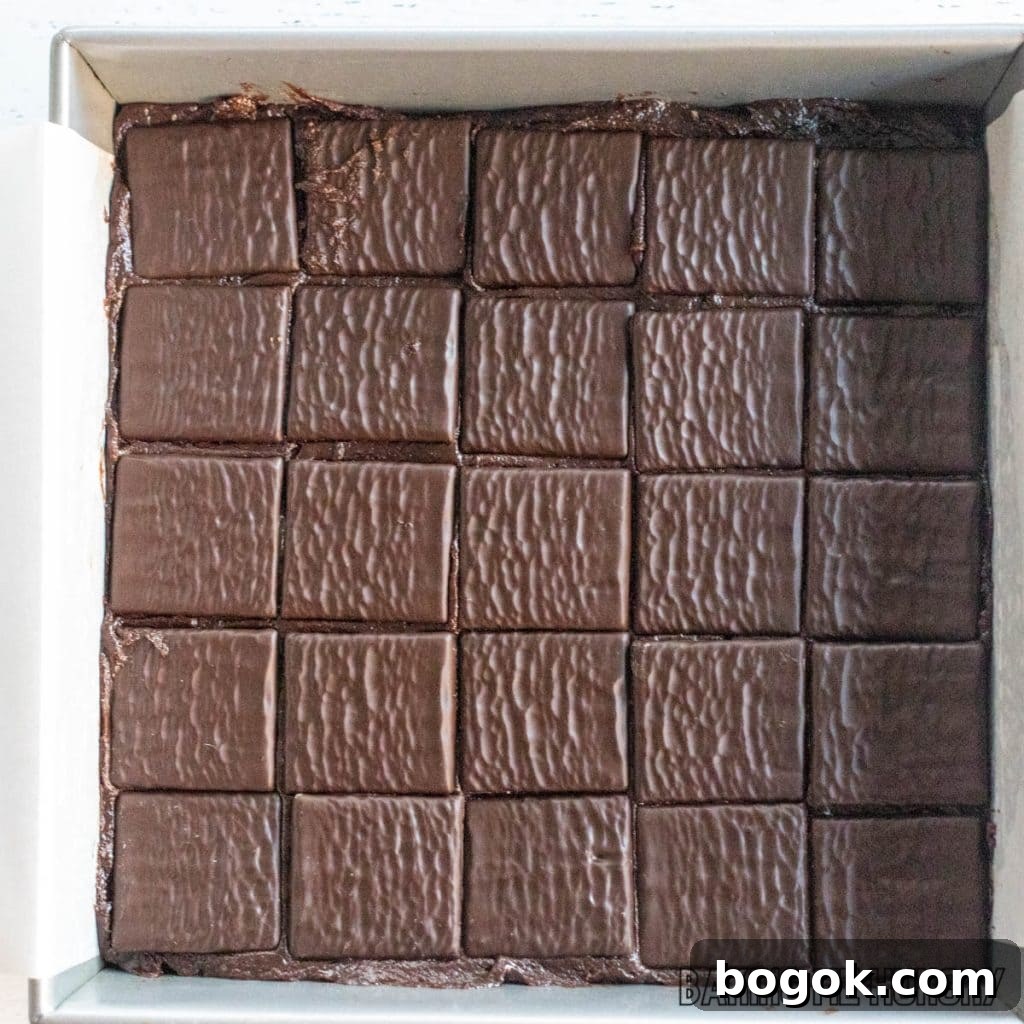 After Eight Mint Brownies Recipe — Classic Chocolate Mint Treat 11 after eight mints on top of batter