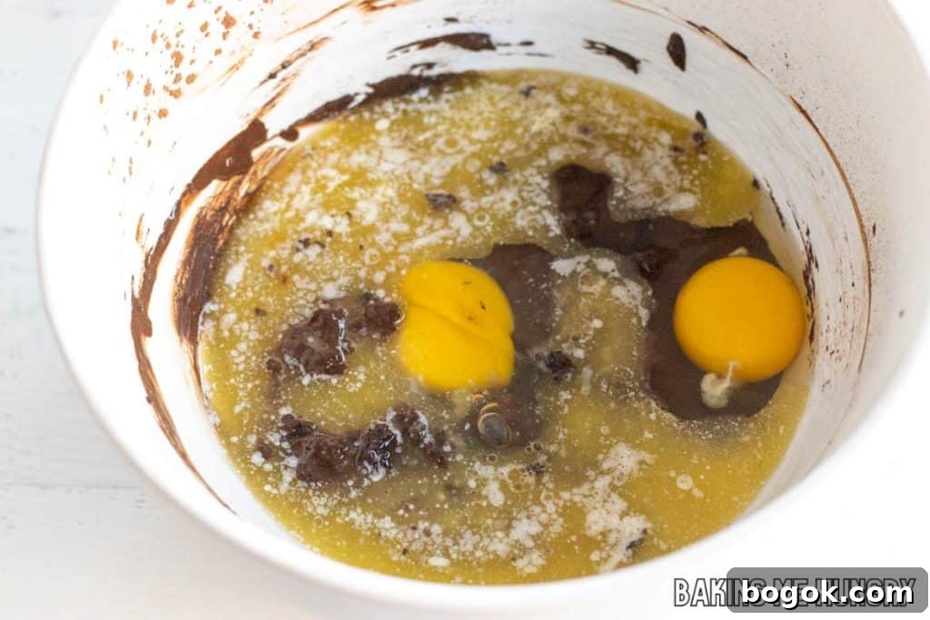 After Eight Mint Brownies Recipe — Classic Chocolate Mint Treat 7 wet ingredients in bowl