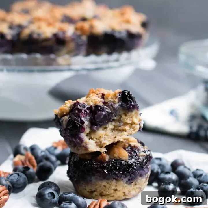 Blueberry Pie Baked Oatmeal. A pile of fresh blueberries and buttery crumb topping create a delicious fruity pie layer on top of hearty baked oatmeal.