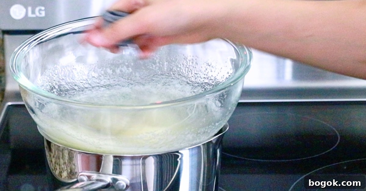 Swiss Meringue Buttercream: Glossy, Stable Frosting Recipe 5 mixing egg whites and sugar with a whisk