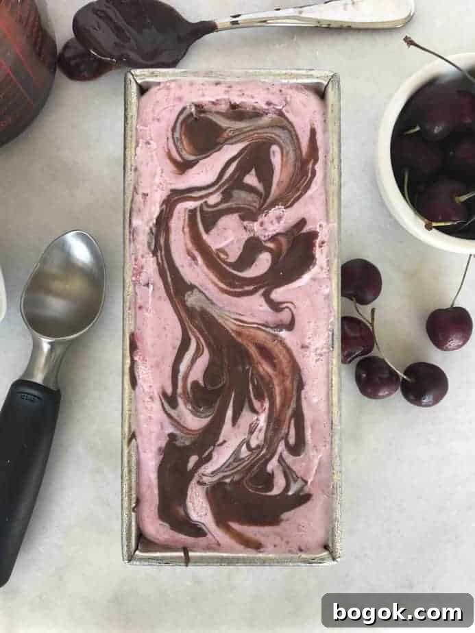 No-Churn Cherry Ice Cream with Chocolate Ganache Swirls 3 over head of ice cream with chocolate swirls in loaf pan